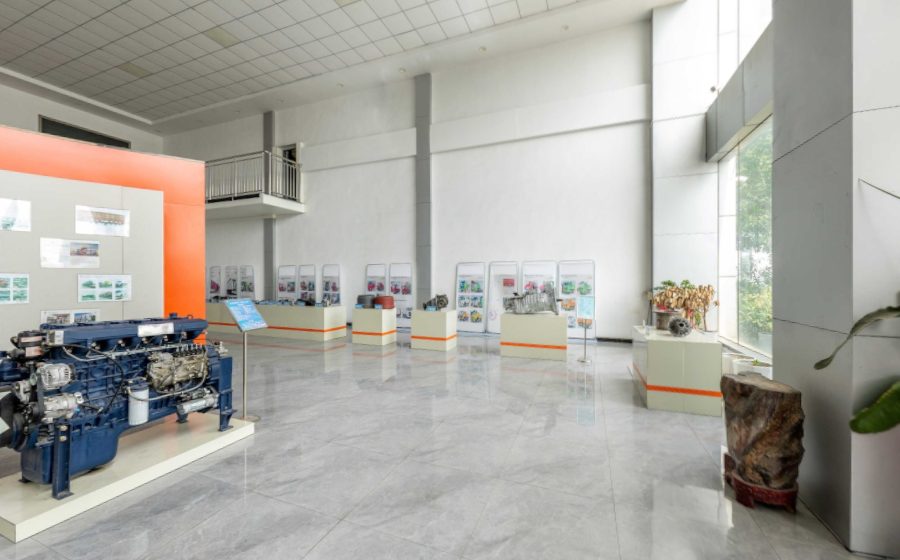 Business hall with engines and parts on display