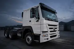 White HOWO 371 6x4 tractor truck — illustrative studio image