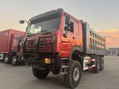 Real photo · HOWO 6x6 all-wheel drive dump truck with red cab and grey tipper body, current vehicle photo