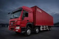 Red HOWO 8x4 box truck — illustrative studio image