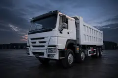 White HOWO 371 8x4 dump truck — illustrative studio image