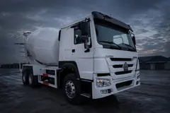 White HOWO concrete mixer truck — illustrative studio image