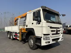 Real photo · HOWO 6x4 truck-mounted crane with folded boom, current vehicle photo