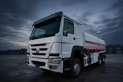 HOWO 6x4 fuel tanker truck with cylindrical tank body — illustrative studio image