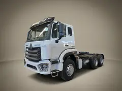 HOWO NX 371 6x4 Tractor Head – Front view in the warehouse