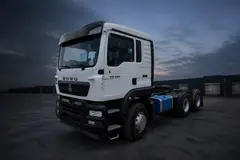 White HOWO TX 6x4 premium tractor truck — illustrative studio image